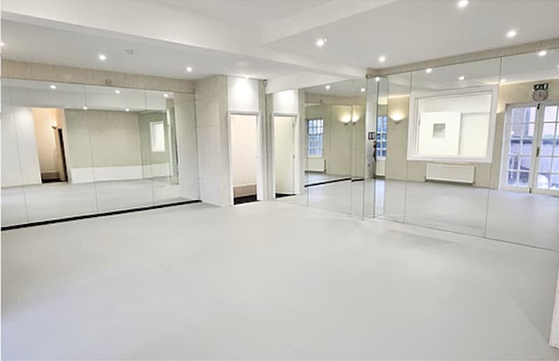 Dance Studio 1 at D2E Academy — sprung floor and full-wall mirrors